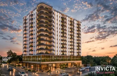 Rendering ufficiale di Invicta Villa Morra: l’edificio residenziale con balconi curvi al tramonto